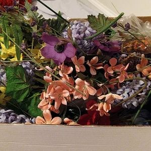 Assorted fake flowers and leaves for craft…
